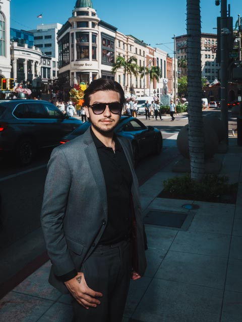 Man in suit portrait on Rodeo Drive Beverly Hills by Johnny Hann